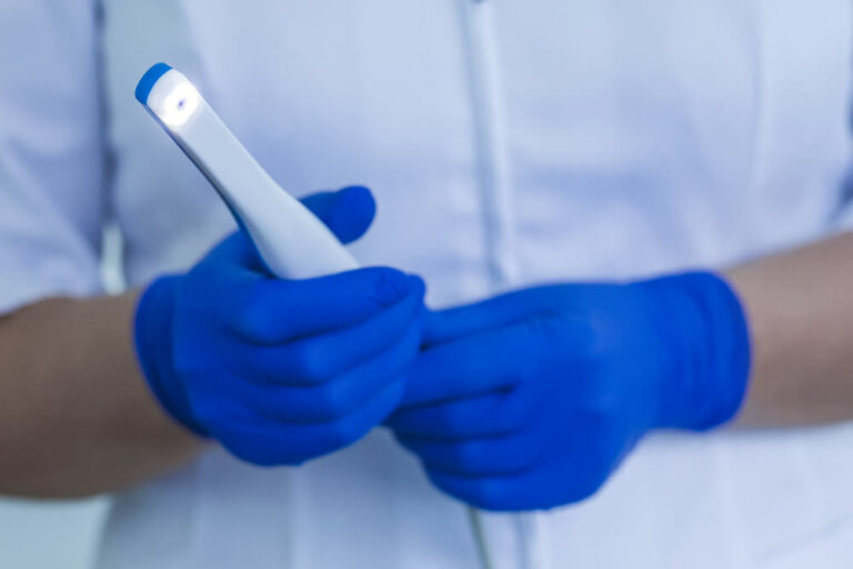 Doctor holding an intraoral scanner